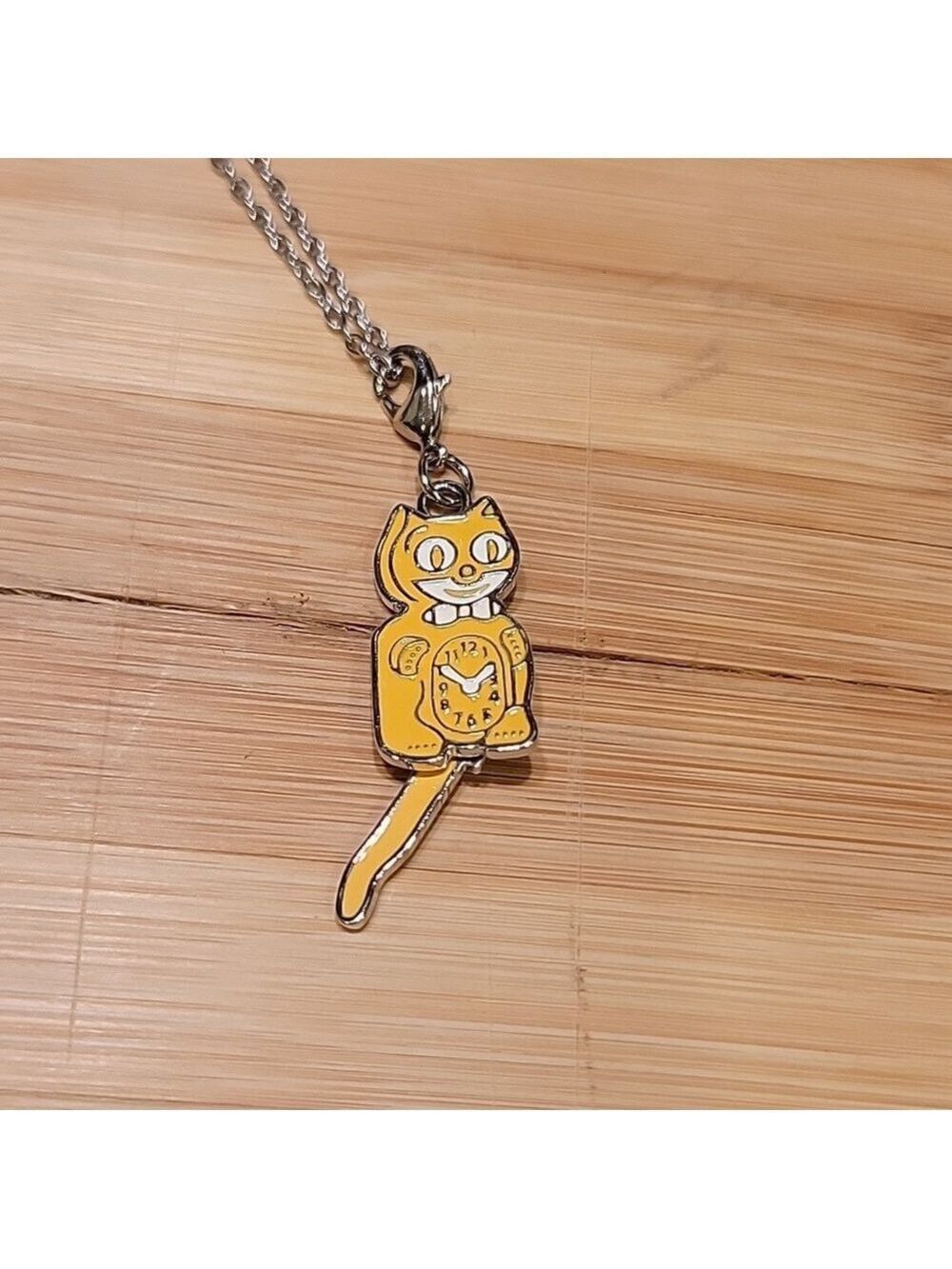 Majestic Yellow Kit-Cat Klock clock clip on charm necklace